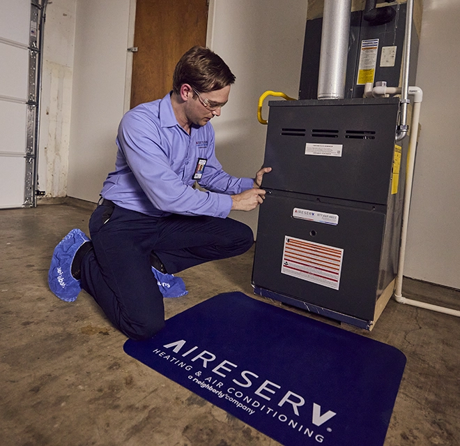 Technician working on a garage.
