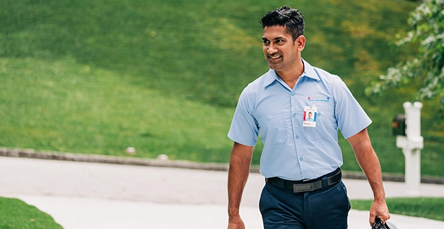 An asv technician arriving for work.