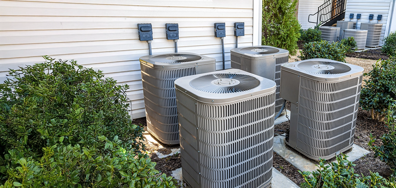 4 HVAC units on side of home.
