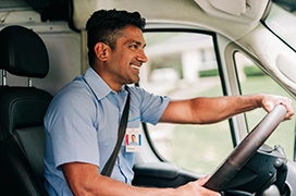 Aire serv technician driving the van.