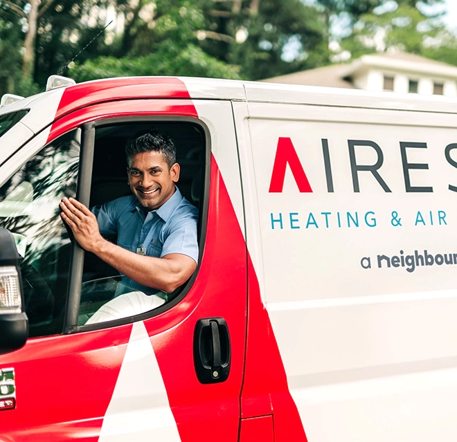 Air Serv Professional Driving an Aire Serv Van.