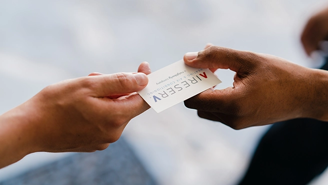 Aire Serv business card.