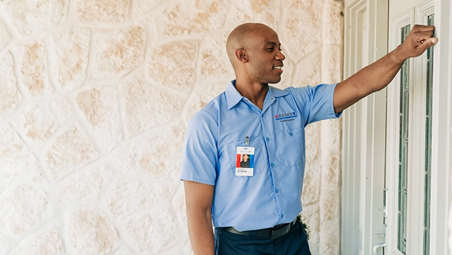 Aire Serv service professional installing a new oil furnace.